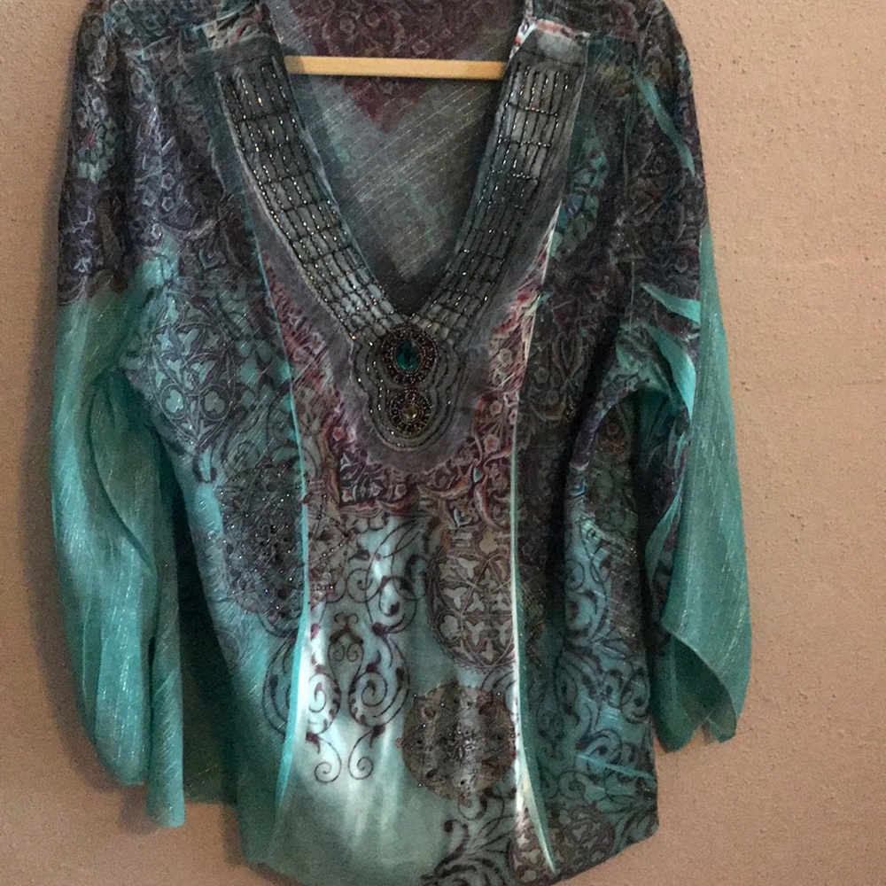 Gorgeous top with fun details